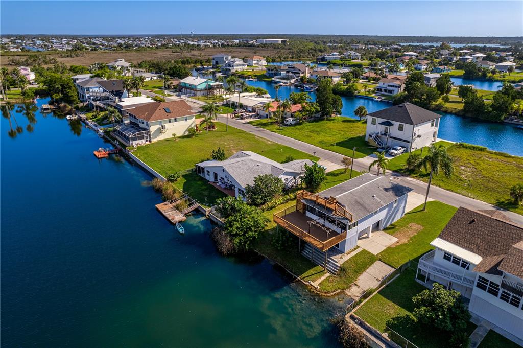 3397 Crape Myrtle Drive Hernando Beach, FL 34607 - Photo 55 of 76 an aerial view of a house with a garden