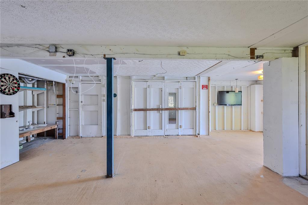 3397 Crape Myrtle Drive Hernando Beach, FL 34607 - Photo 63 of 76 a view of a garage