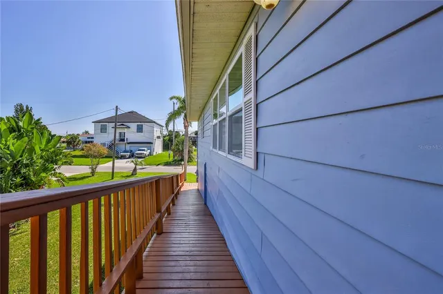 an aerial view of a house with a ocean view