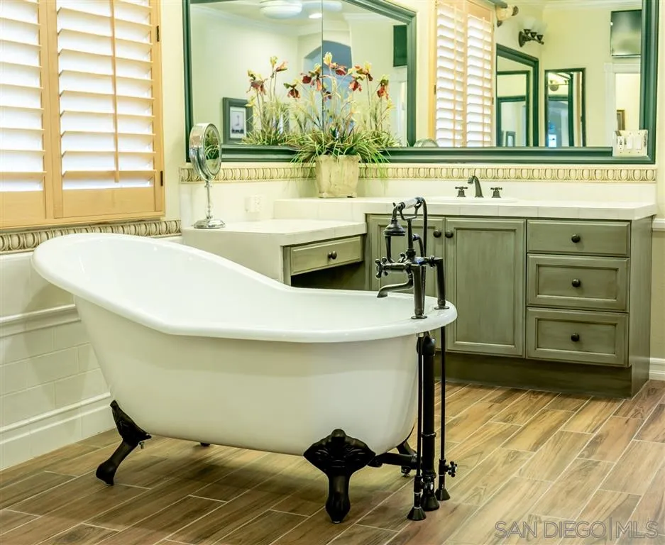 11683 Eastfield Road Poway, CA 92064 - Photo 12 of 21 a bathroom with a sink and a mirror