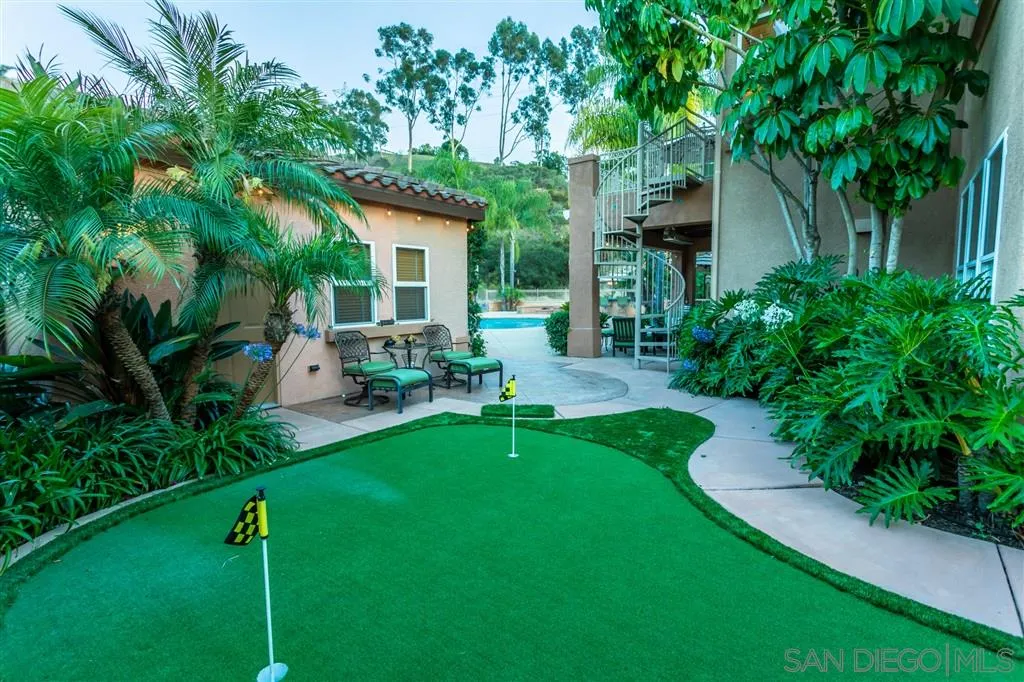 11683 Eastfield Road Poway, CA 92064 - Photo 20 of 21 a garden with trees in front of it