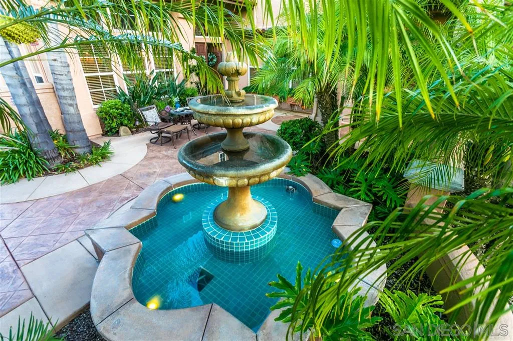 11683 Eastfield Road Poway, CA 92064 - Photo 2 of 21 a view of a swimming pool with sitting area