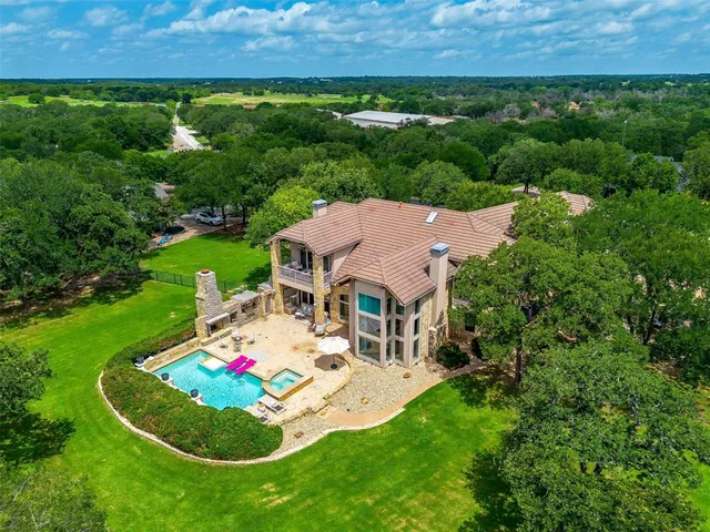 an aerial view of a house with garden