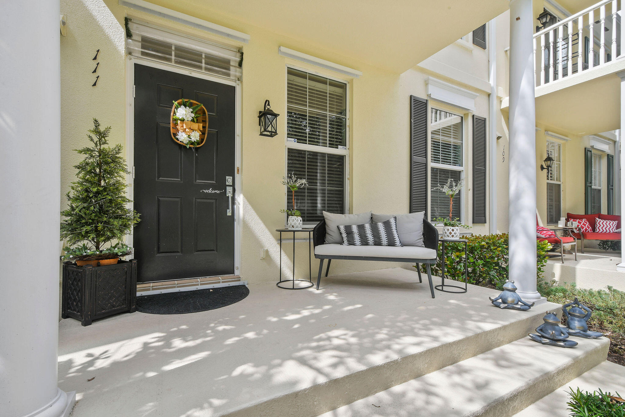 111 Ashley Court Jupiter, FL 33458 - Photo 1 of 68 a view of a house with a patio and a yard