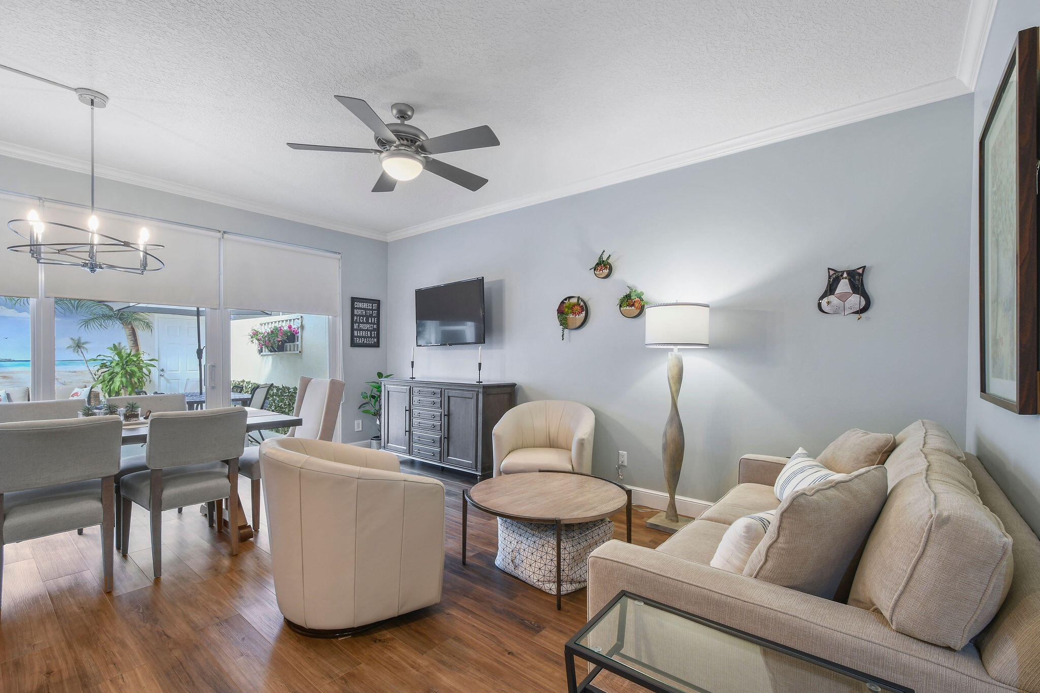 111 Ashley Court Jupiter, FL 33458 - Photo 11 of 68 a living room with furniture and a wooden floor