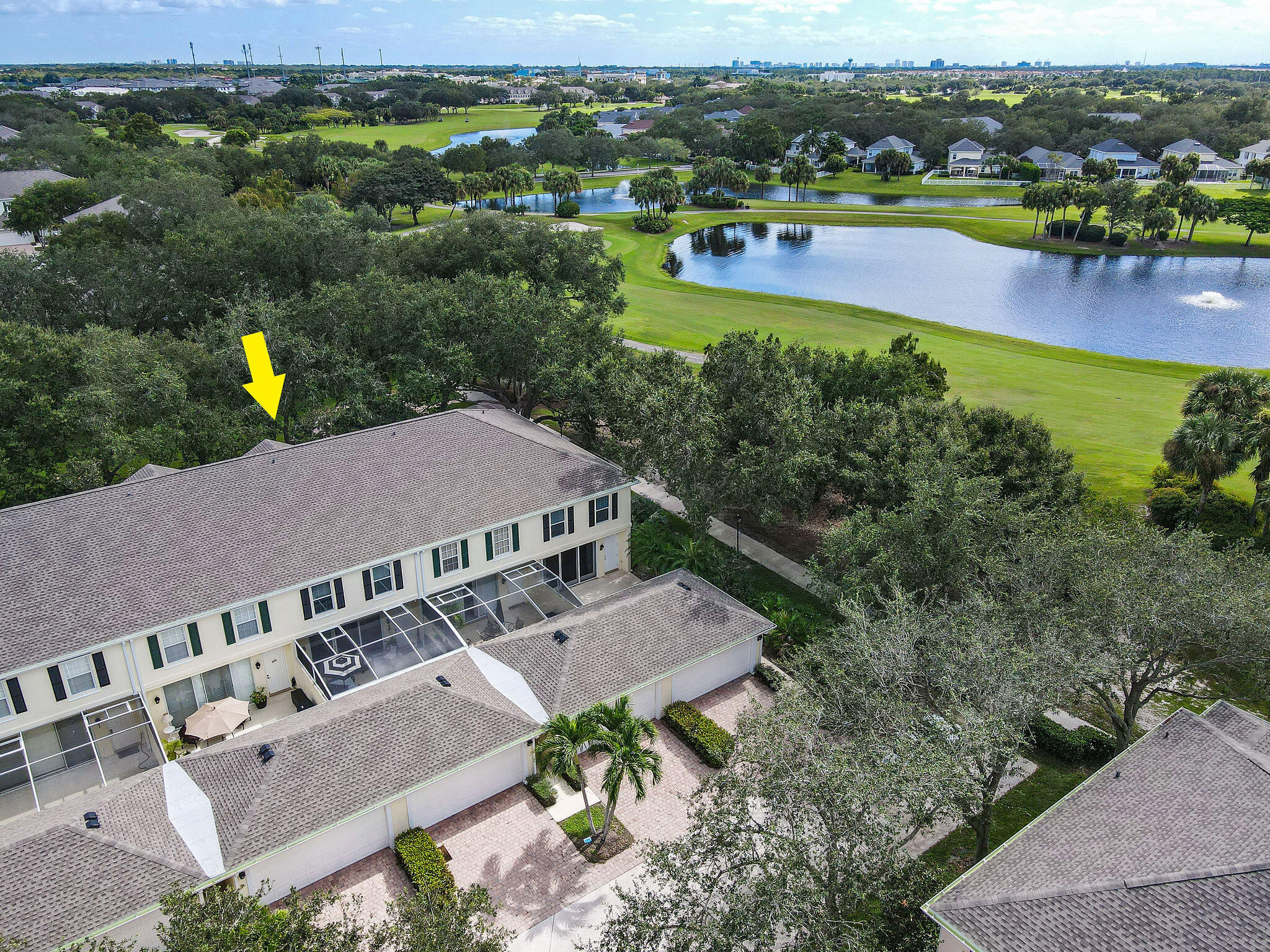 111 Ashley Court Jupiter, FL 33458 - Photo 2 of 68 an aerial view of a house with a garden