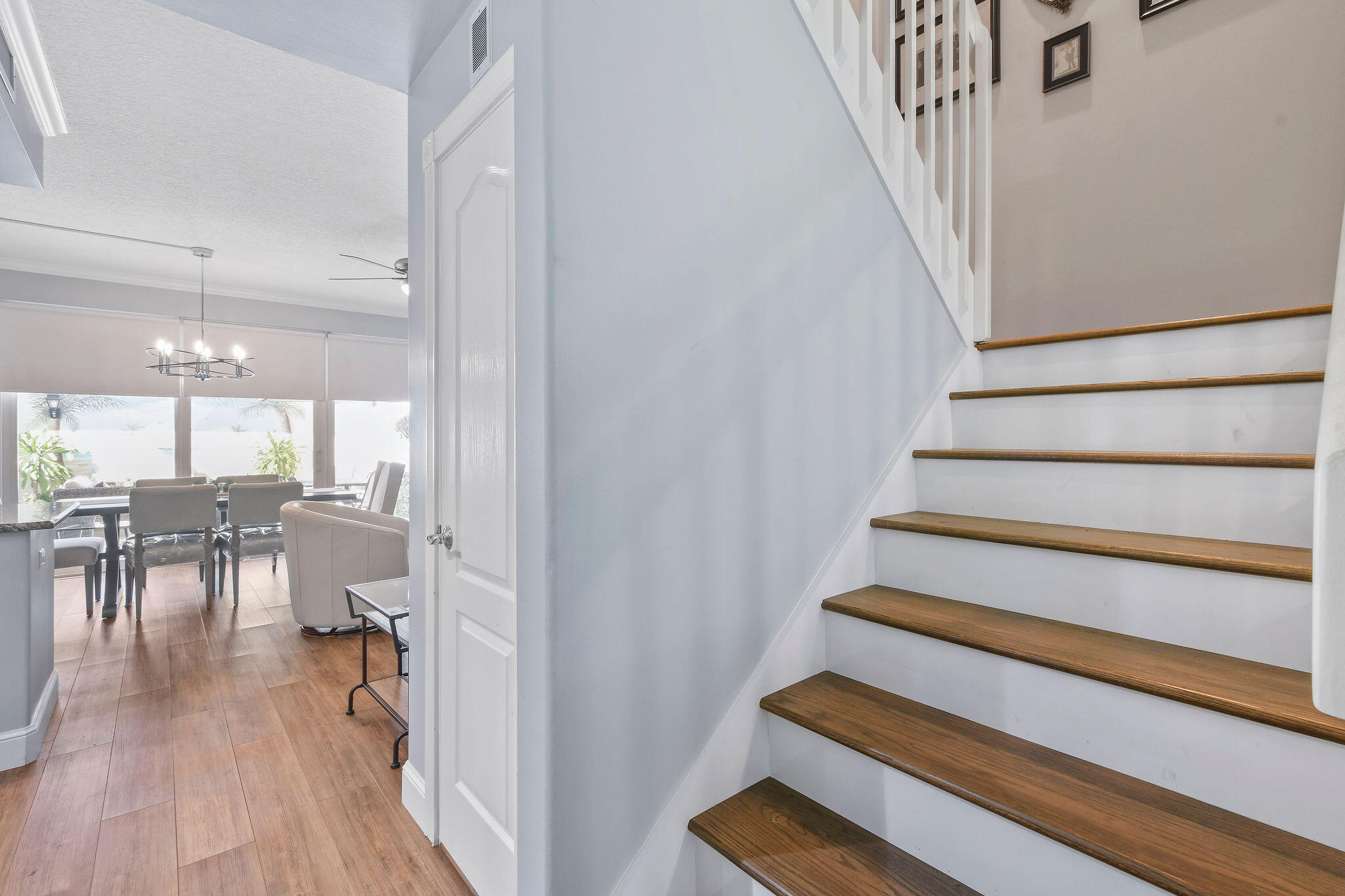 111 Ashley Court Jupiter, FL 33458 - Photo 25 of 68 a view of entryway and hall with wooden floor