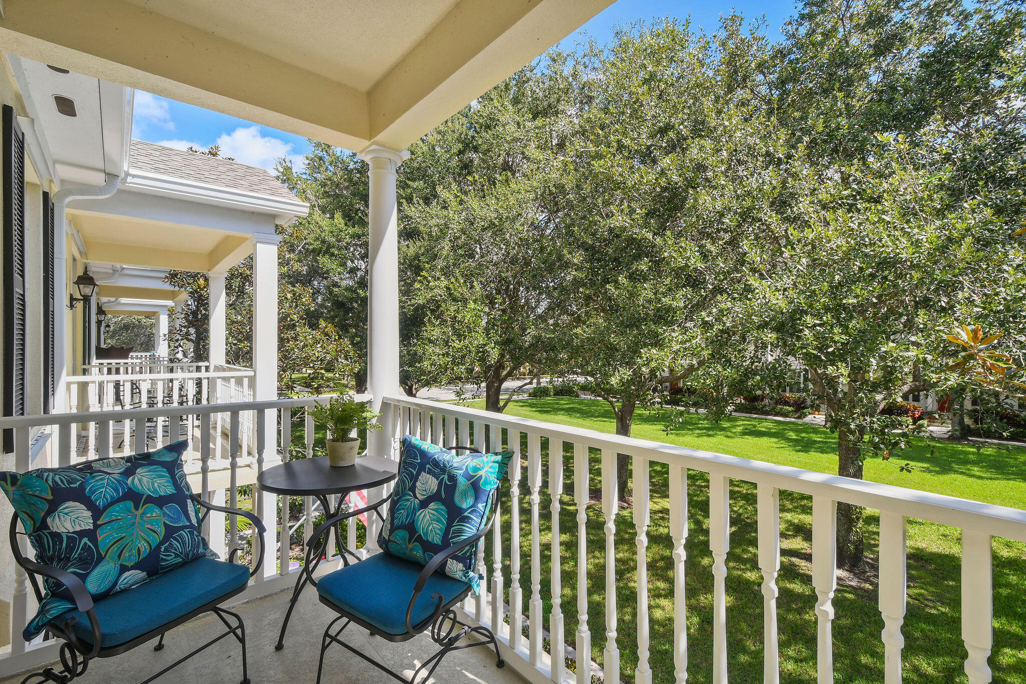 111 Ashley Court Jupiter, FL 33458 - Photo 32 of 68 a view of a chair and table in the balcony