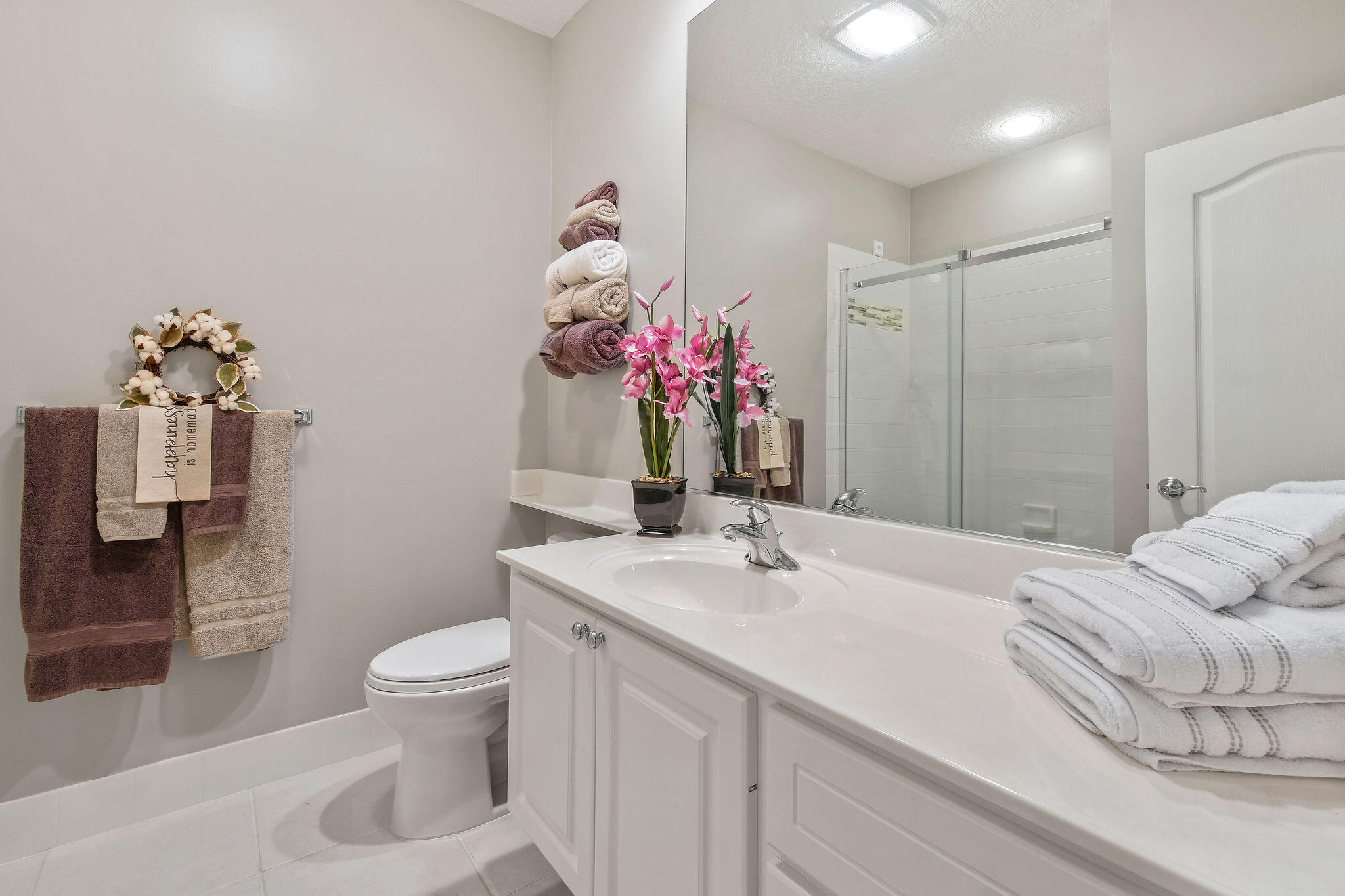 111 Ashley Court Jupiter, FL 33458 - Photo 37 of 68 a bathroom with a sink toilet and shower