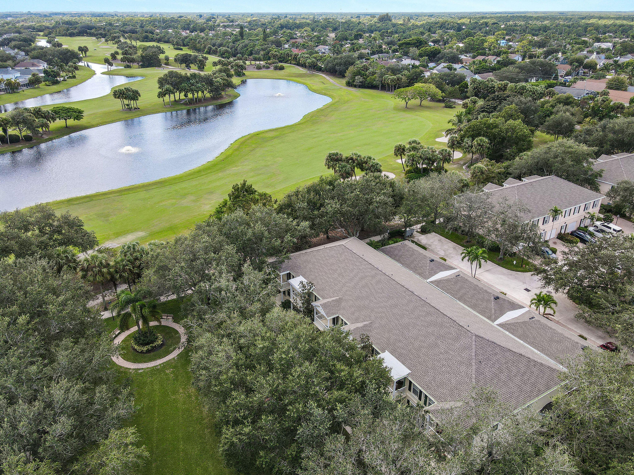111 Ashley Court Jupiter, FL 33458 - Photo 45 of 68 an aerial view of residential houses with outdoor space and river