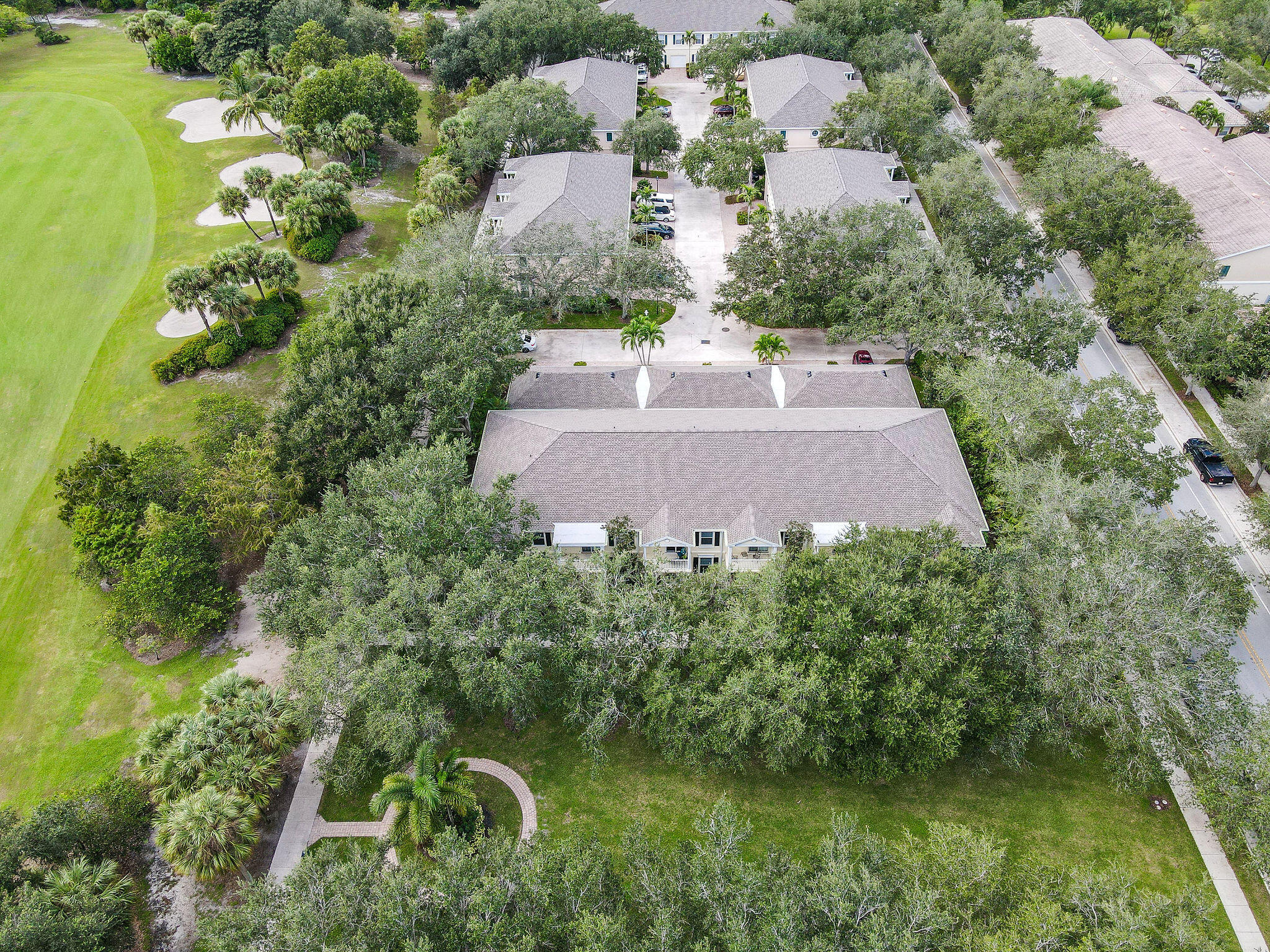 111 Ashley Court Jupiter, FL 33458 - Photo 47 of 68 an aerial view of a house with a yard and lake view