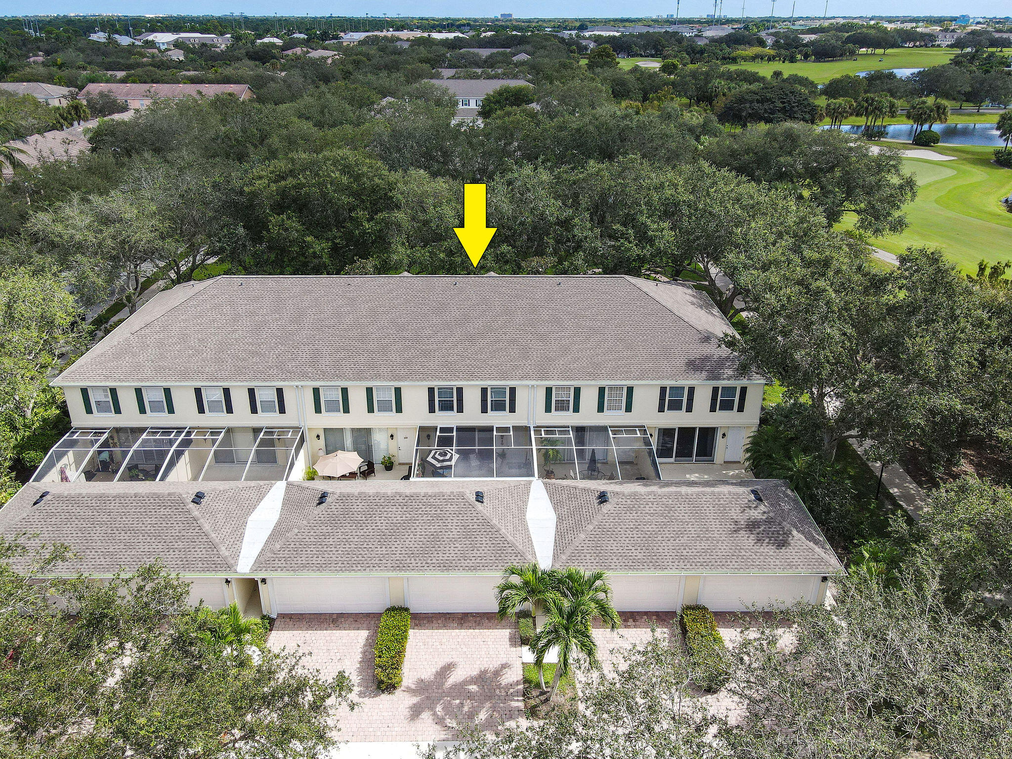 111 Ashley Court Jupiter, FL 33458 - Photo 53 of 68 an aerial view of a house with a garden