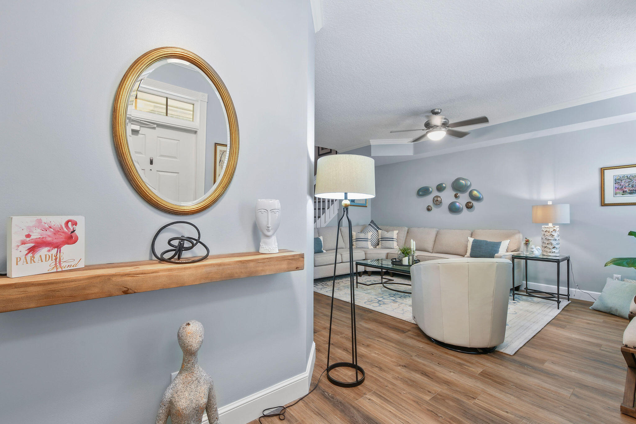 111 Ashley Court Jupiter, FL 33458 - Photo 6 of 68 a living room with furniture and a mirror