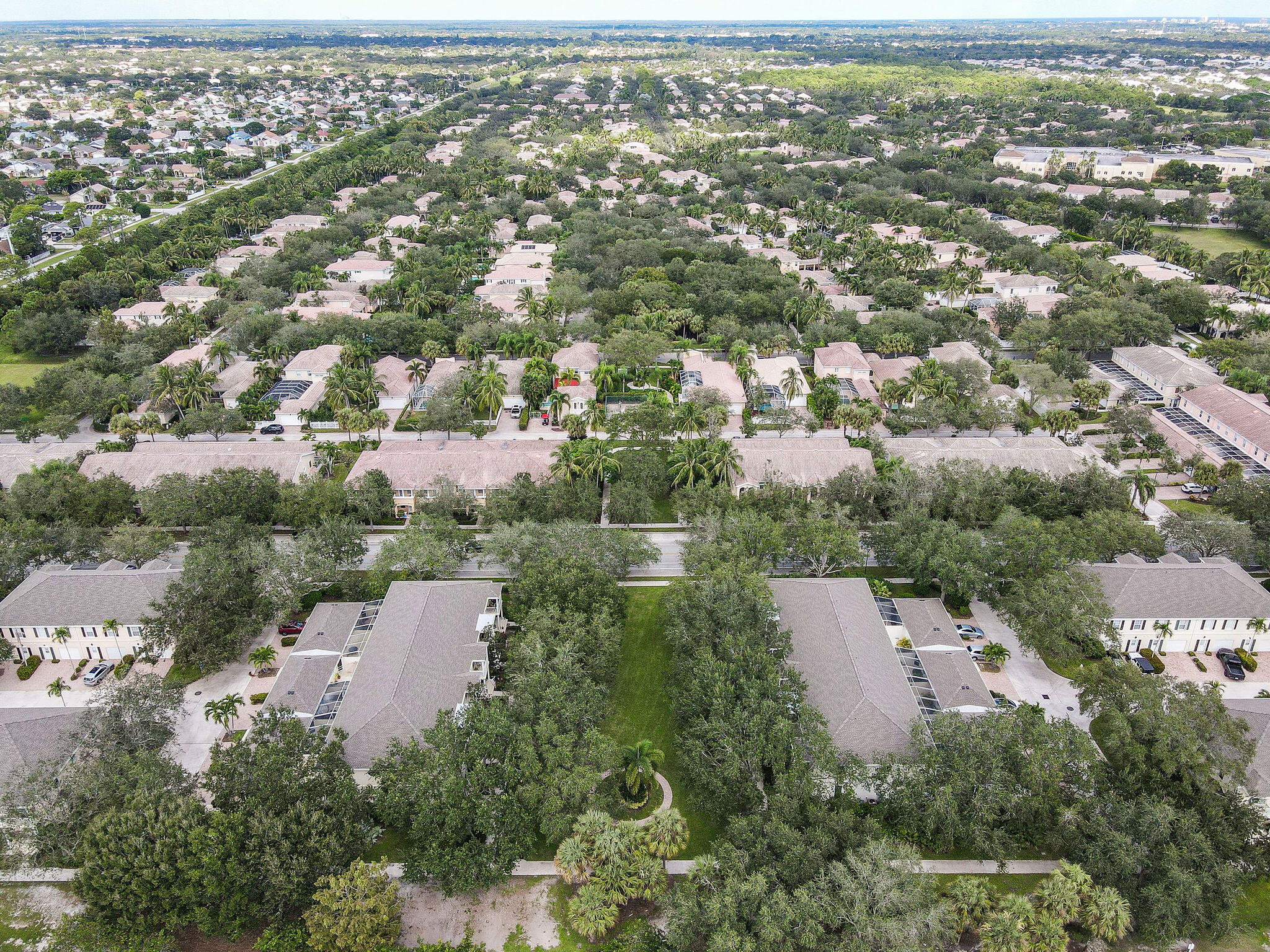 111 Ashley Court Jupiter, FL 33458 - Photo 67 of 68 an aerial view of residential houses with city view