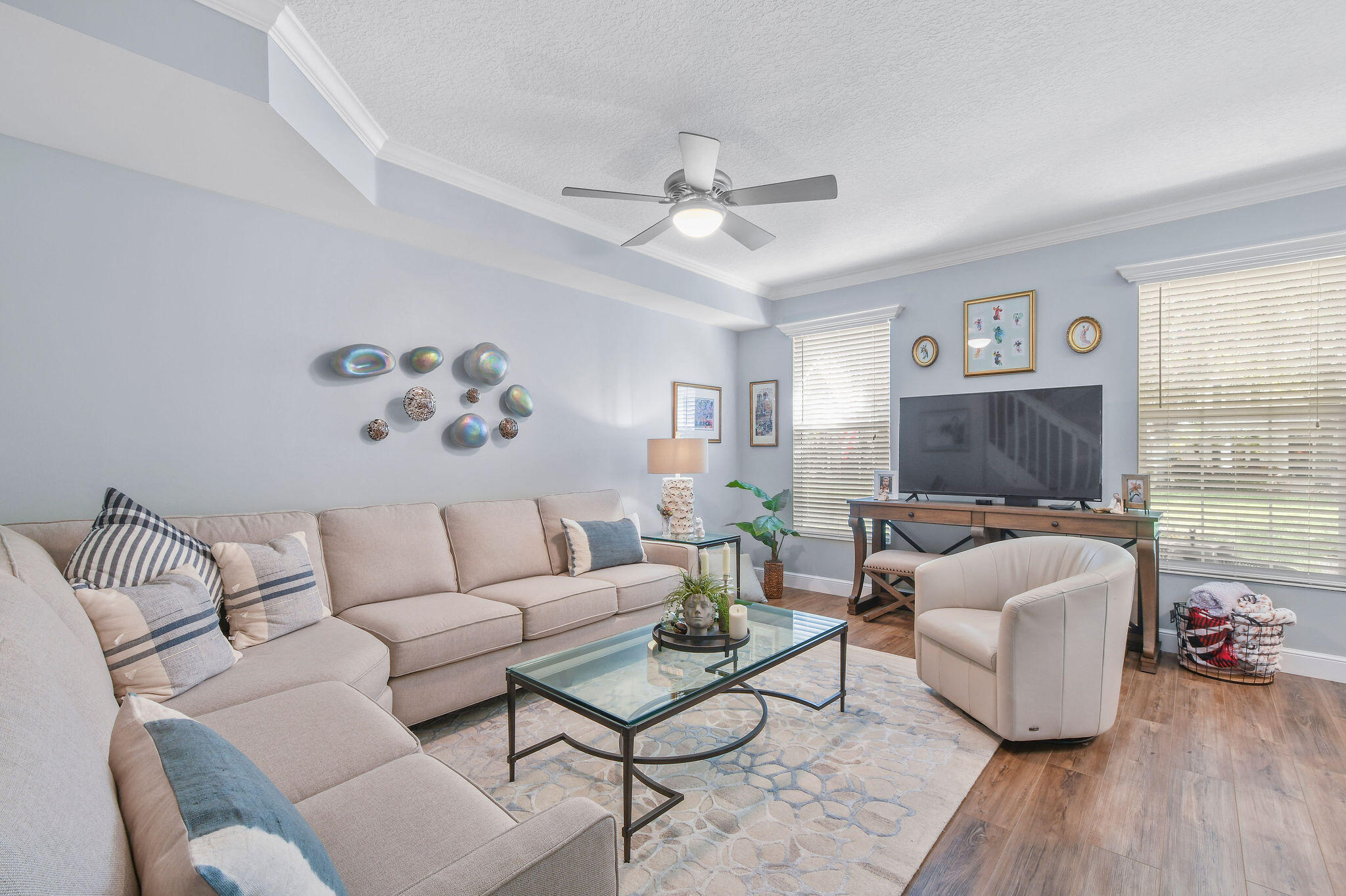 111 Ashley Court Jupiter, FL 33458 - Photo 9 of 68 a living room with furniture and a flat screen tv