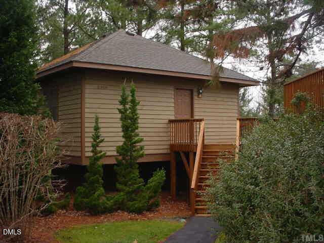 3345 Mill Run Raleigh, NC 27612 - Photo 1 of 11 a backyard of a house with plants and tree
