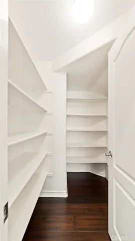 a view of a house with backyard porch and sitting area