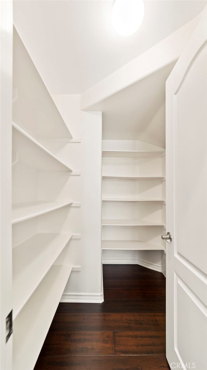 637 Chaparral Court Altadena, CA 91001 - Photo 14 of 58 a view of walk in closet with empty racks