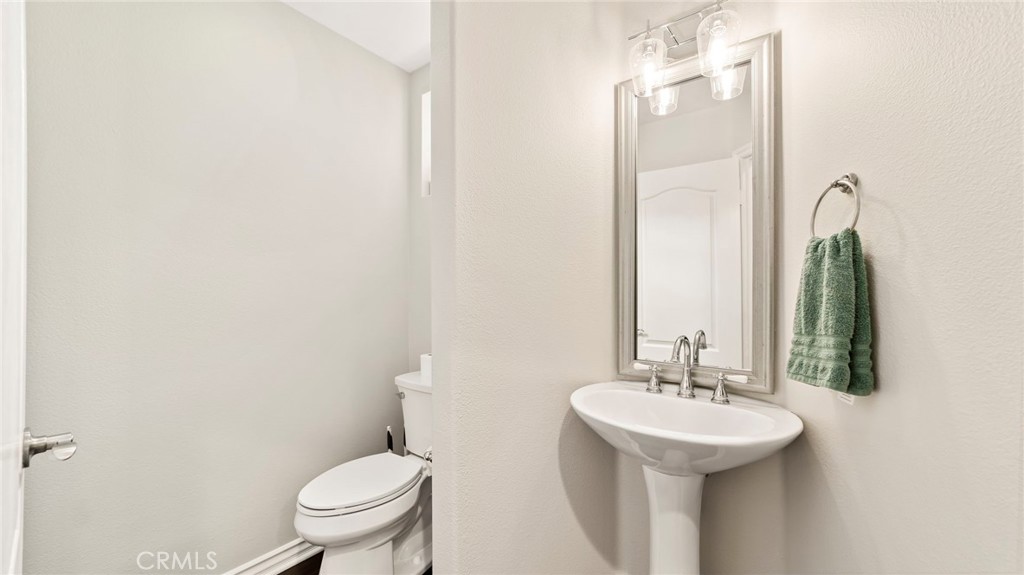 637 Chaparral Court Altadena, CA 91001 - Photo 20 of 58 a bathroom with a sink a toilet and a mirror