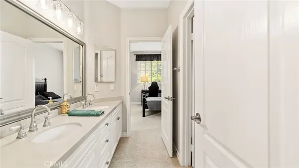 a view of a house with backyard porch and sitting area
