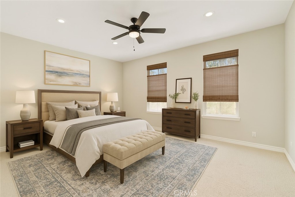 637 Chaparral Court Altadena, CA 91001 - Photo 43 of 58 a spacious bedroom with a large bed a chandelier and dresser