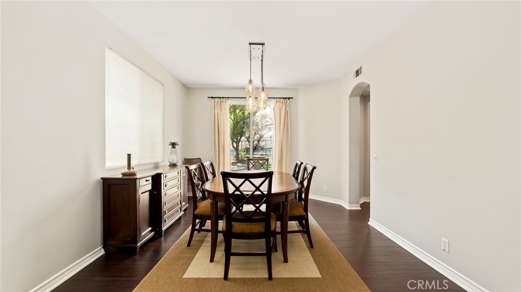 637 Chaparral Court Altadena, CA 91001 - Photo 6 of 58 a view of a dining room with furniture window and wooden floor