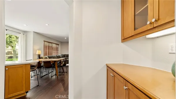 a kitchen with stainless steel appliances kitchen island granite countertop a sink and cabinets