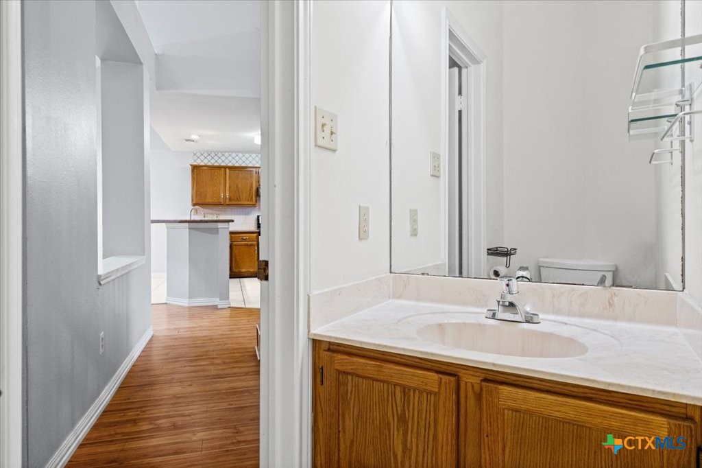 12502 Fallen Tower Lane Austin, TX 78753 - Photo 17 of 28 a bathroom with a sink and a mirror