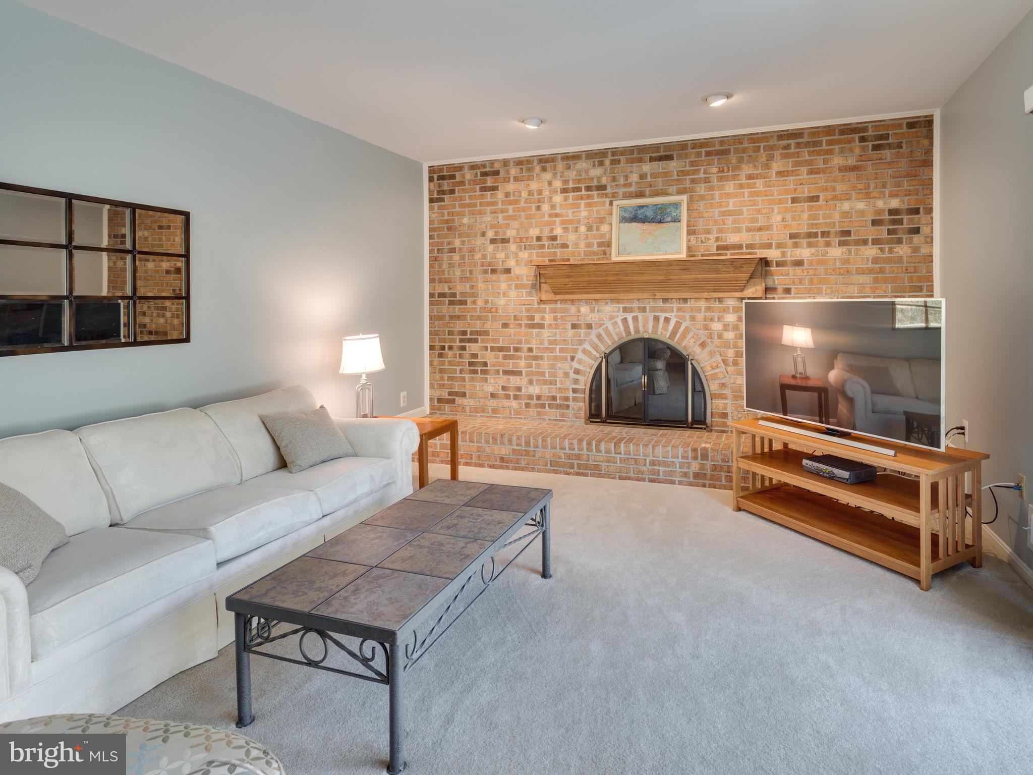 9907 Natick Road Burke, VA 22015 - Photo 11 of 30 Family Room with wood burning fireplace