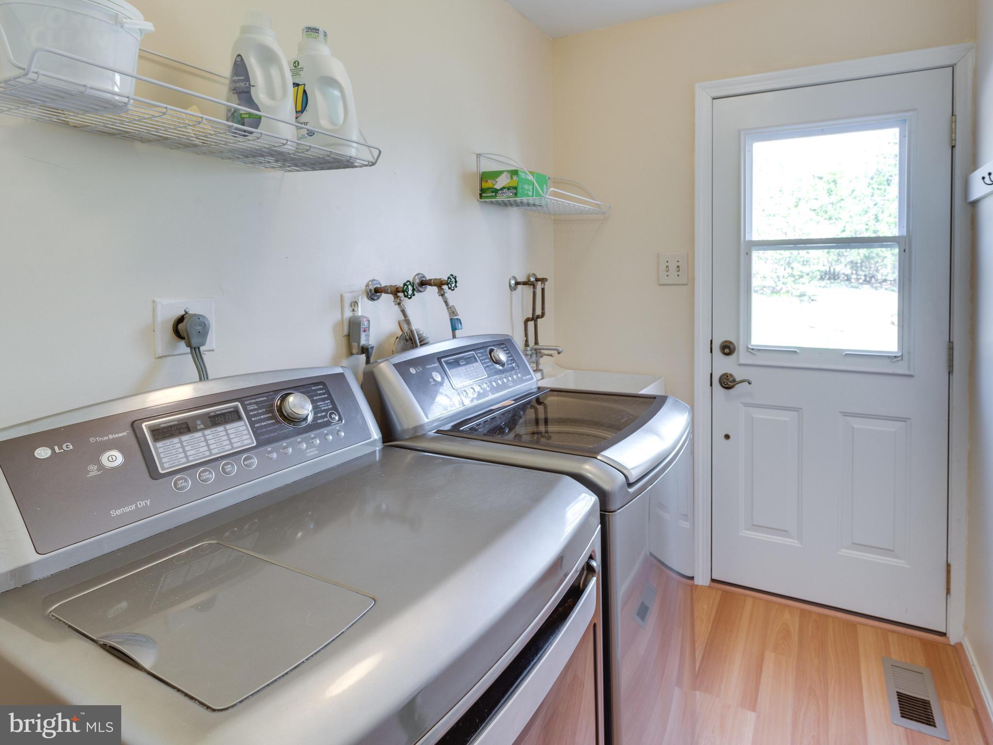 9907 Natick Road Burke, VA 22015 - Photo 25 of 30 Laundry Room on Kitchen level. Door to back yard.