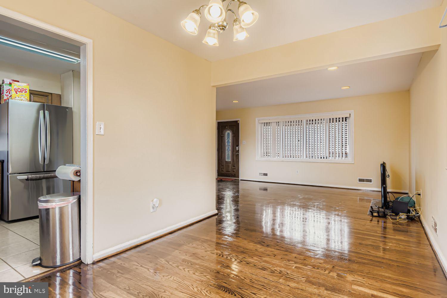 8504 Fieldway Drive Randallstown, MD 21133 - Photo 17 of 20 a view of a livingroom with wooden floor