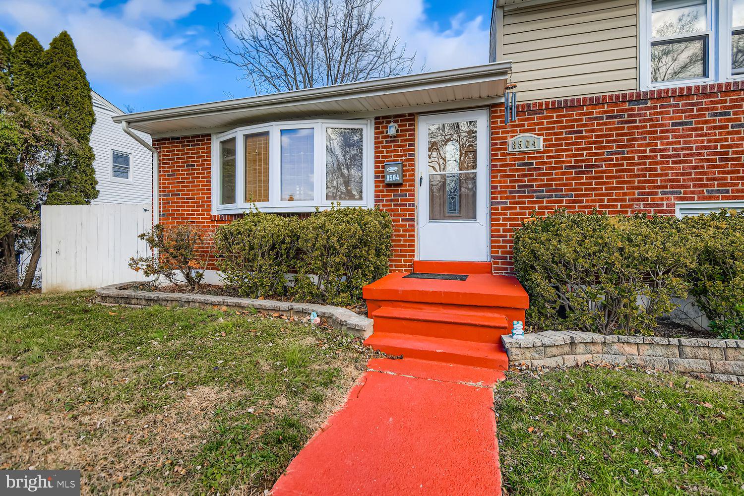 8504 Fieldway Drive Randallstown, MD 21133 - Photo 19 of 20 a front view of a house with a yard