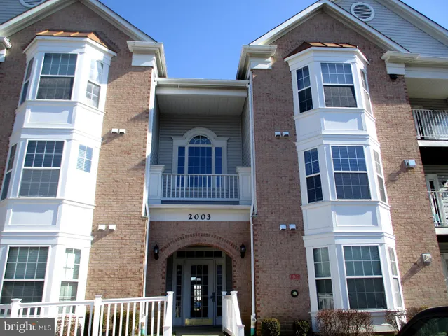 a front view of a multi story building