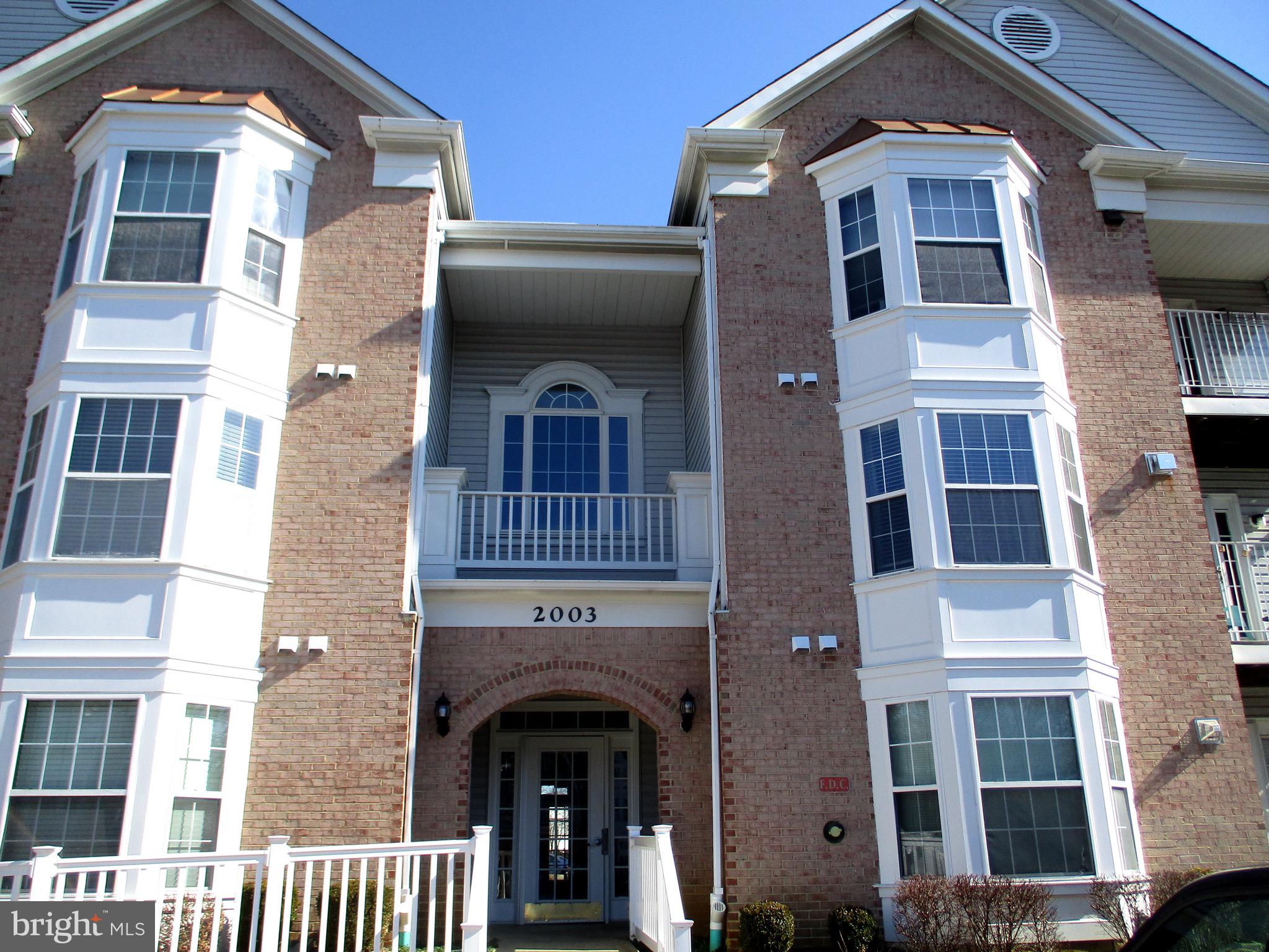 2003 Phillips Terrace, Unit 6 Annapolis, MD 21401 - Photo 1 of 11 a front view of a multi story building
