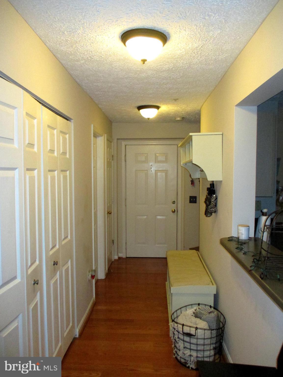 2003 Phillips Terrace, Unit 6 Annapolis, MD 21401 - Photo 8 of 11 a bedroom with a bed and a walk in closet