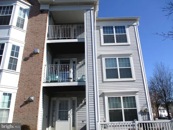 a front view of a house with a door