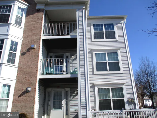 a front view of a house with a door