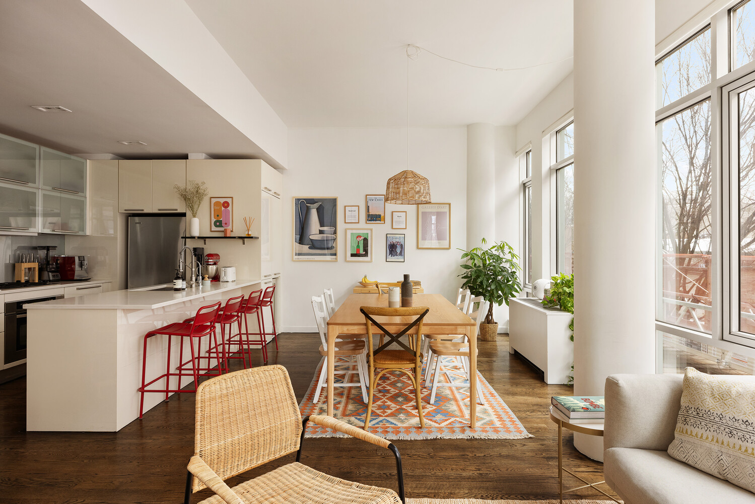 101 North 5th Street, Unit 2AB Brooklyn, NY 11249 - Photo 2 of 13 a living room with furniture a flat screen tv and kitchen view