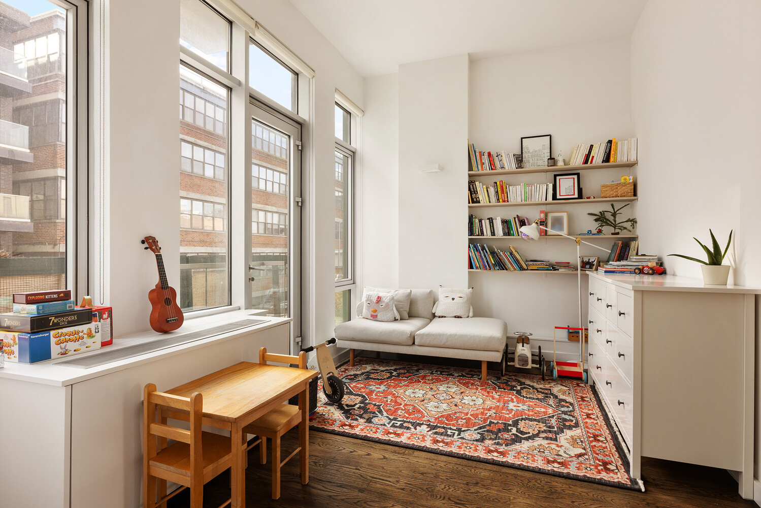101 North 5th Street, Unit 2AB Brooklyn, NY 11249 - Photo 6 of 13 a living room with furniture and a large window