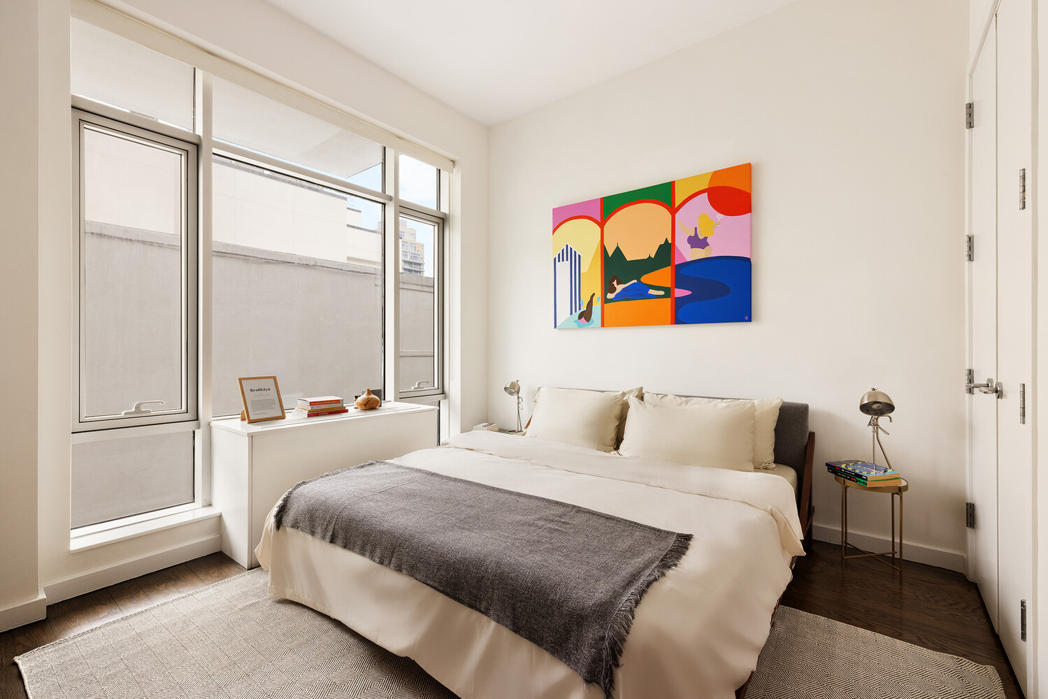101 North 5th Street, Unit 2AB Brooklyn, NY 11249 - Photo 7 of 13 a bedroom with a bed and a window