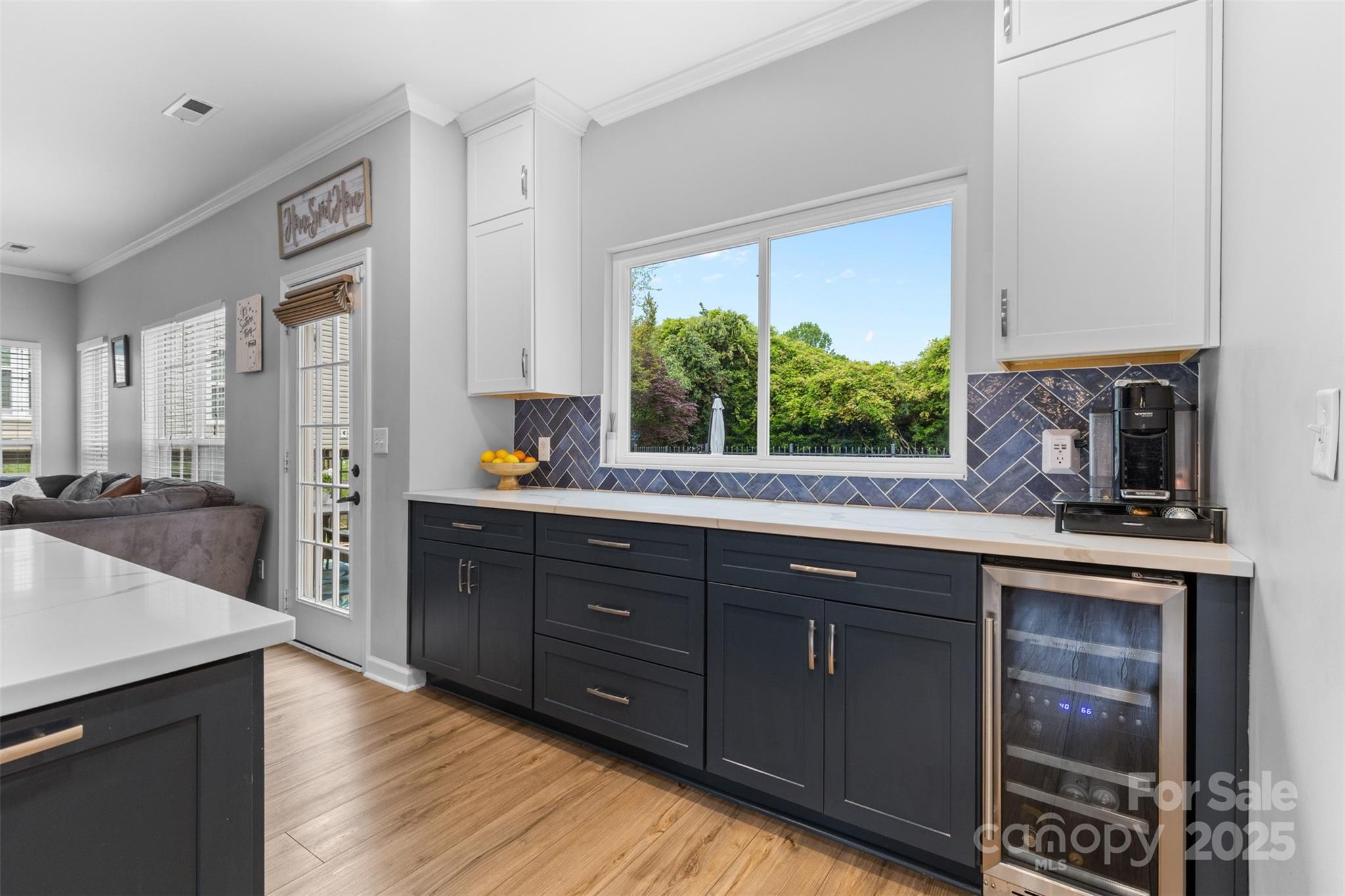 879 Knightsbridge Road Fort Mill, SC 29708 - Photo 16 of 42 a kitchen with stainless steel appliances granite countertop a sink and wooden cabinets