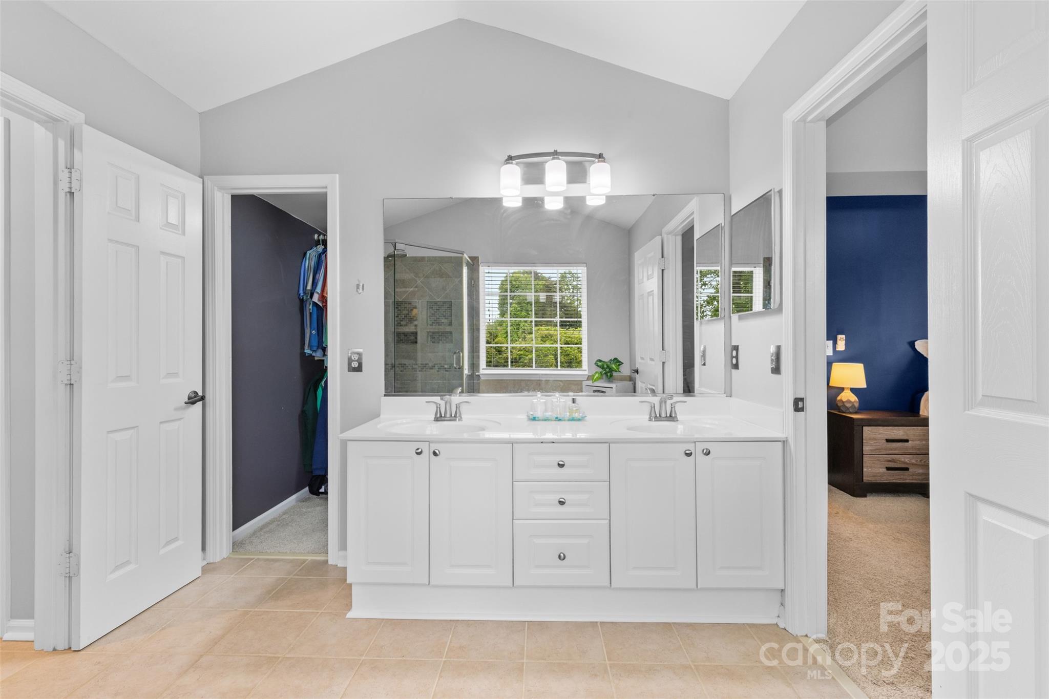 879 Knightsbridge Road Fort Mill, SC 29708 - Photo 27 of 42 a spacious bathroom with double sink and a mirror