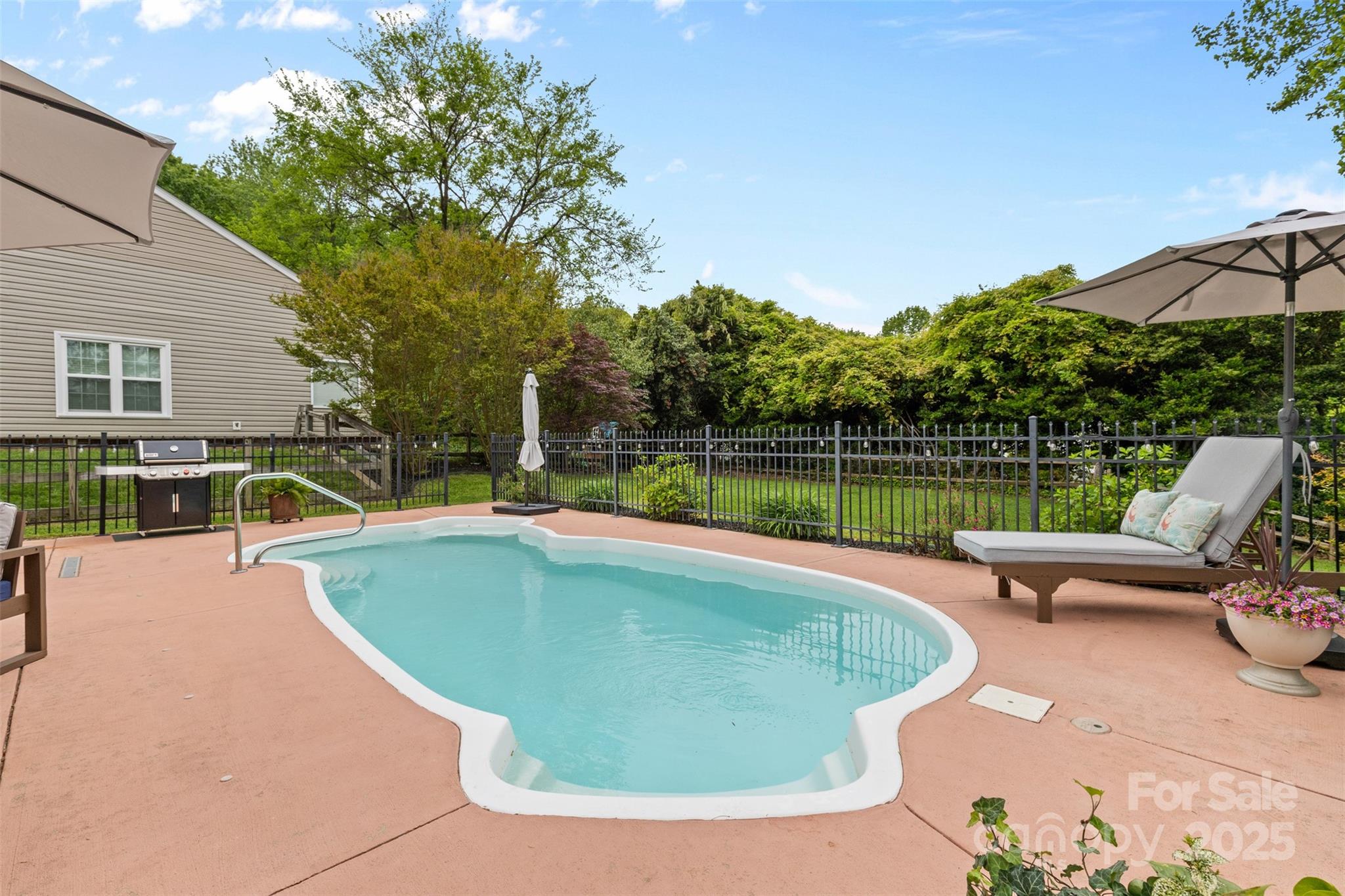 879 Knightsbridge Road Fort Mill, SC 29708 - Photo 37 of 42 a view of a swimming pool with lounge chairs