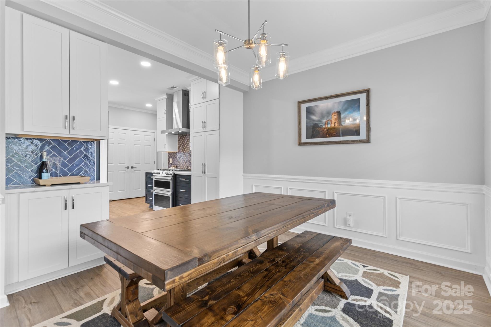879 Knightsbridge Road Fort Mill, SC 29708 - Photo 8 of 42 a open kitchen with a table and chairs
