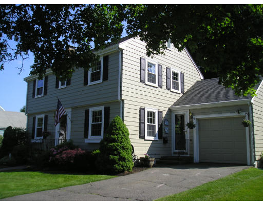 29 Shetland Road Marblehead, MA 01945 - Photo 1 of 1 a front view of a house with a yard and green space