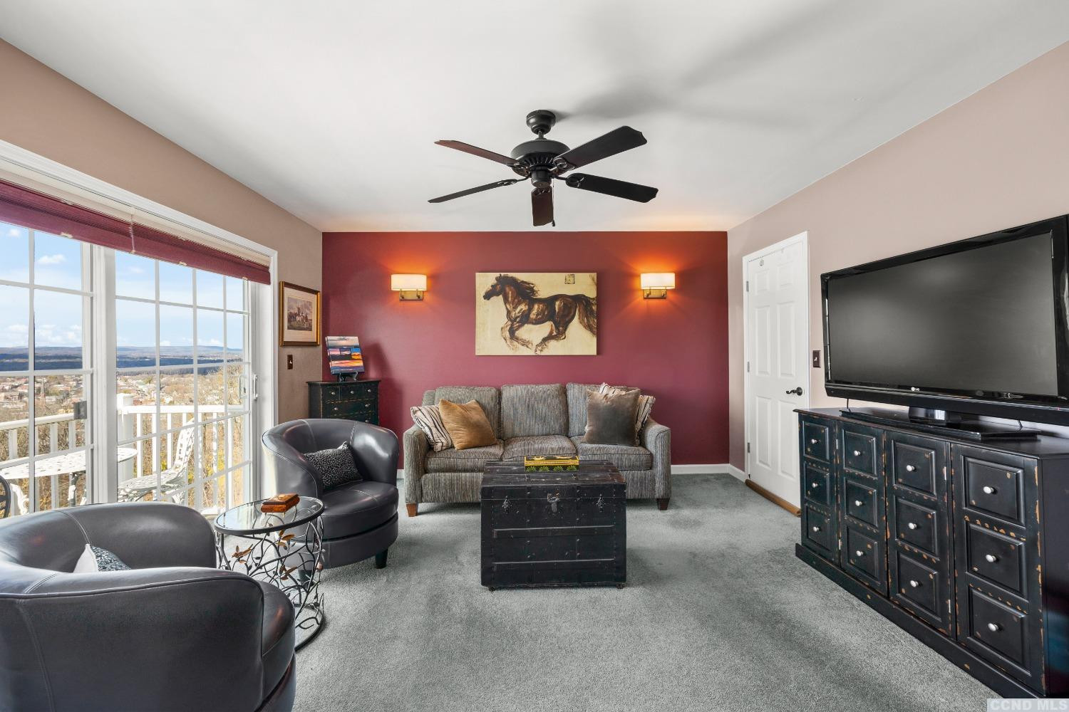17 Academy Hill Drive Hudson, NY 12534 - Photo 15 of 35 a living room with furniture and a flat screen tv