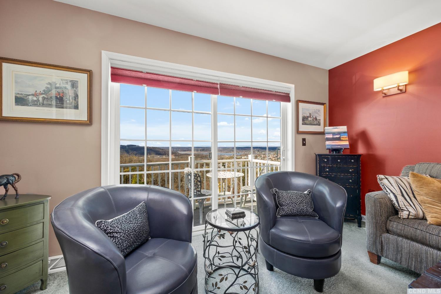 17 Academy Hill Drive Hudson, NY 12534 - Photo 16 of 35 a living room with furniture and a large window