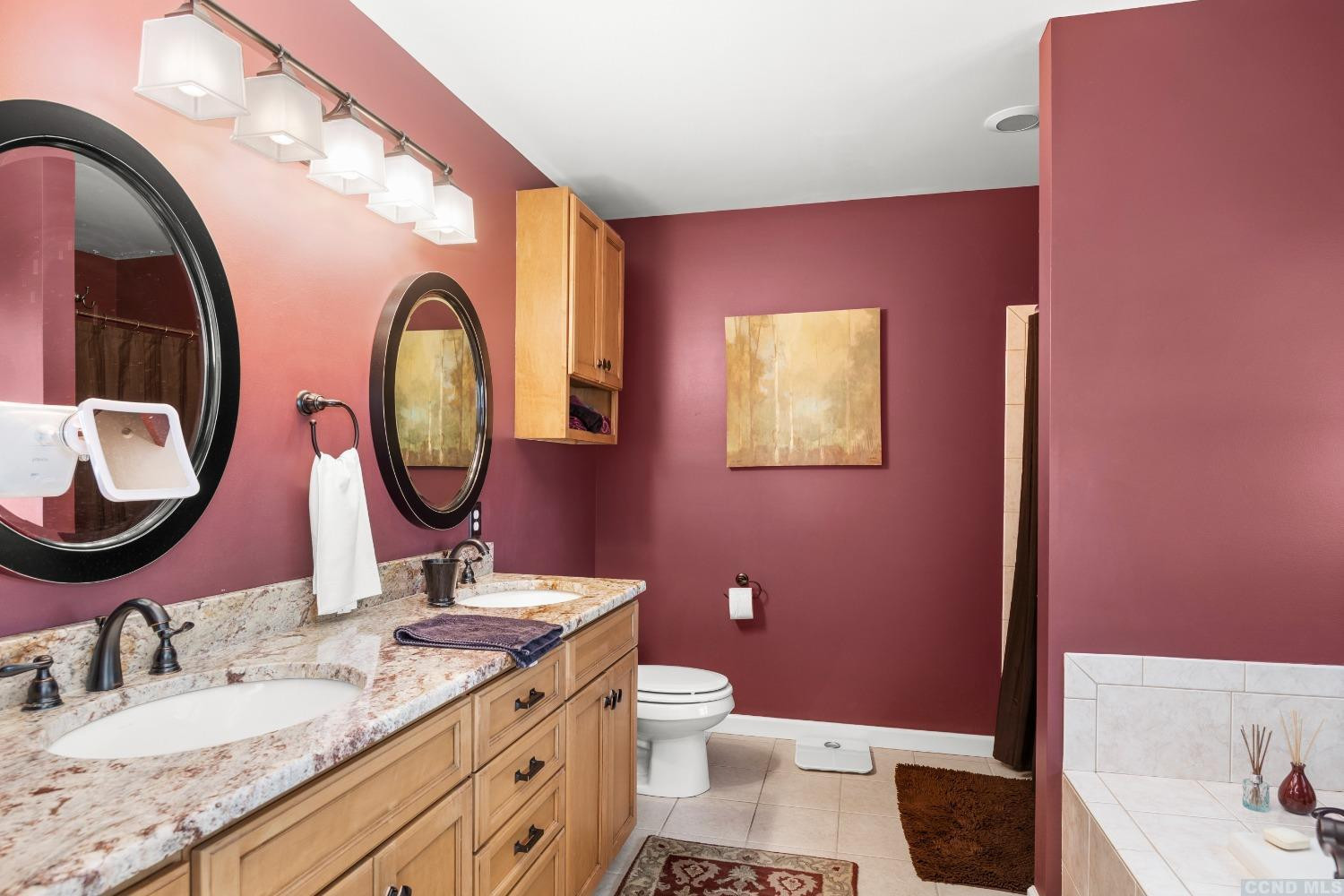 17 Academy Hill Drive Hudson, NY 12534 - Photo 17 of 35 a bathroom with a granite countertop toilet a sink and a mirror