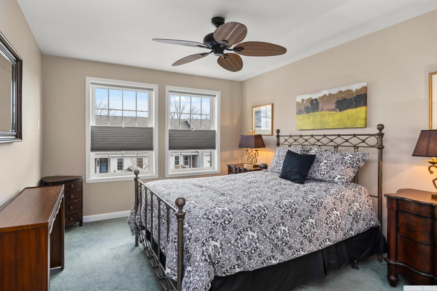 17 Academy Hill Drive Hudson, NY 12534 - Photo 19 of 35 a bedroom with a bed and a chandelier