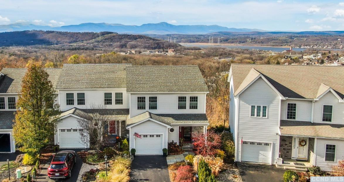 17 Academy Hill Drive Hudson, NY 12534 - Photo 2 of 35 an aerial view of a house with a yard and a large tree